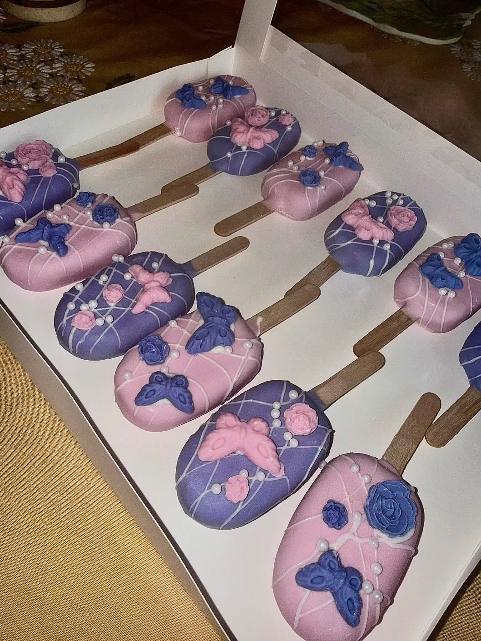 Dozen butterfly-themed cake pops